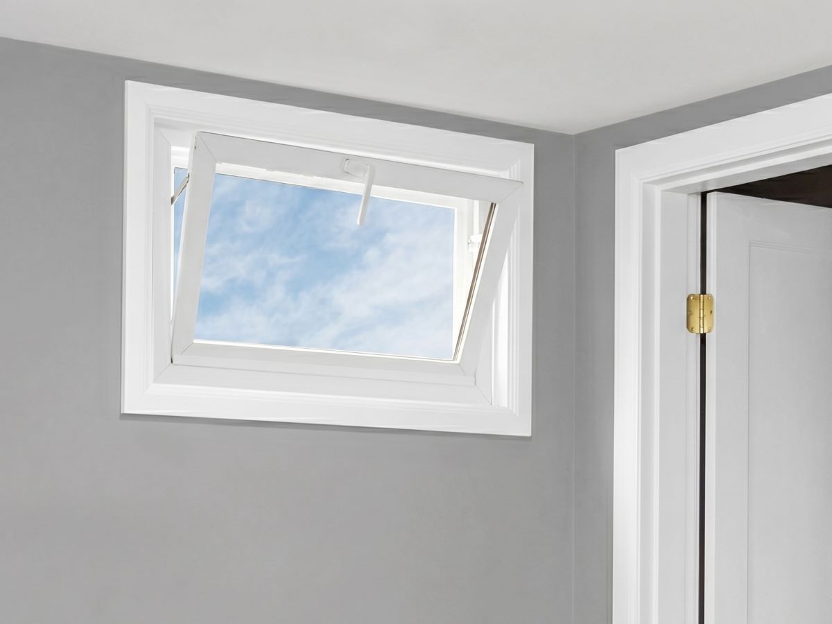 Basement hopper window installation